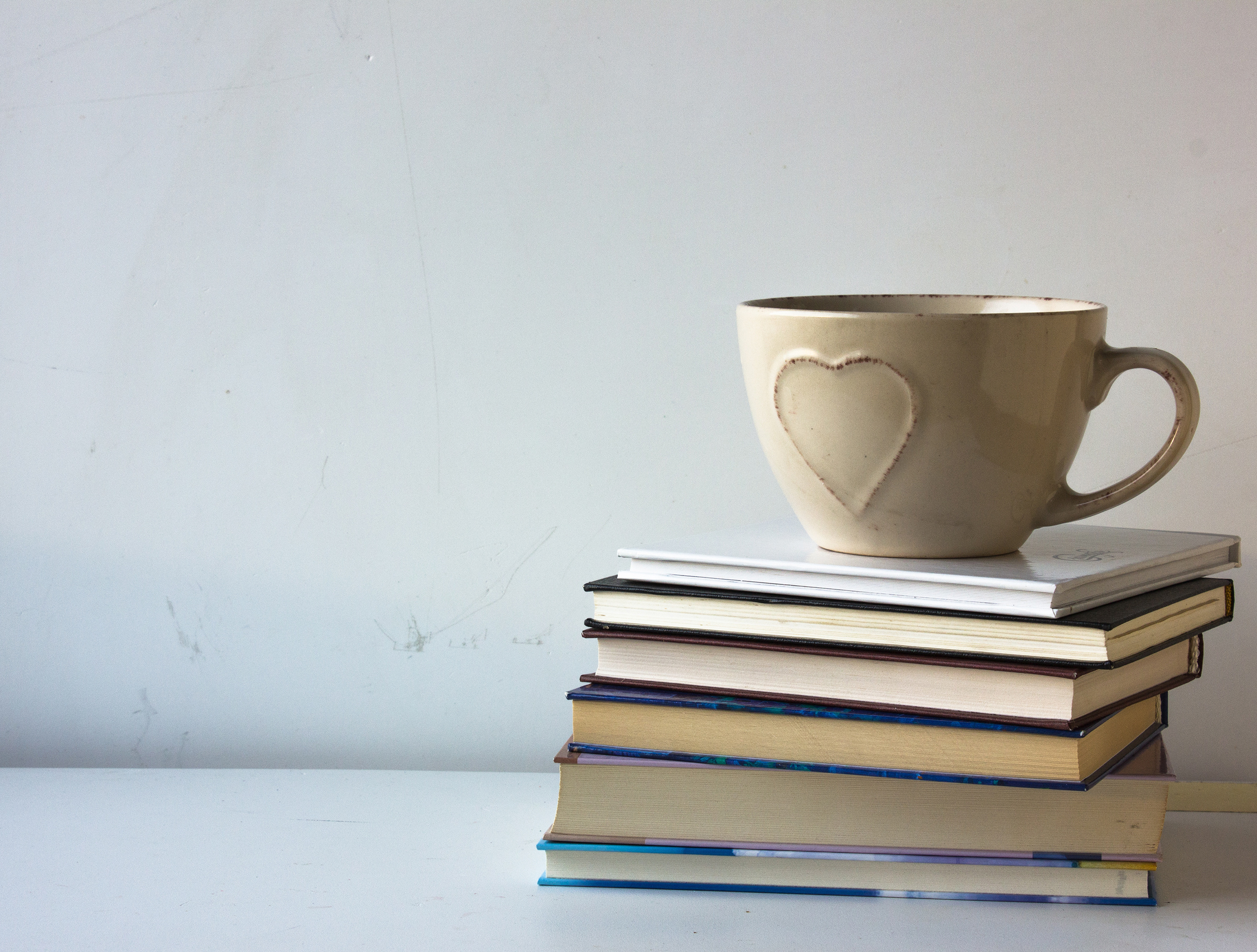 A mug on a stack of books