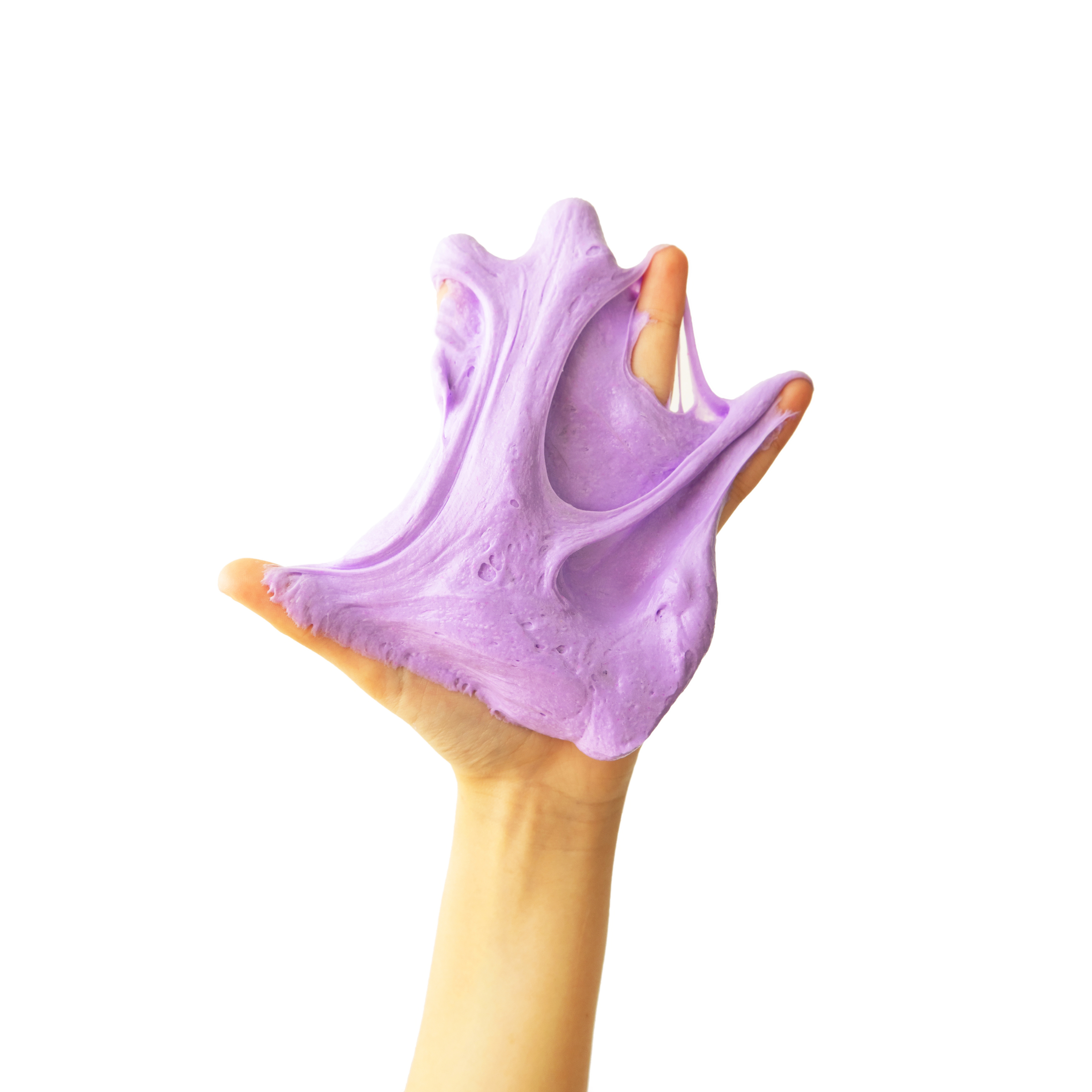An open hand is shown in front of a white background with a sticky purple substance covering it. 