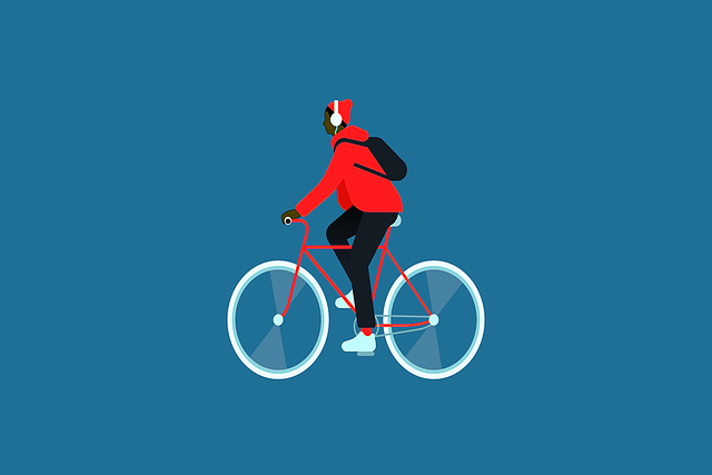 Person in red jacket wearing white headphones riding a bike