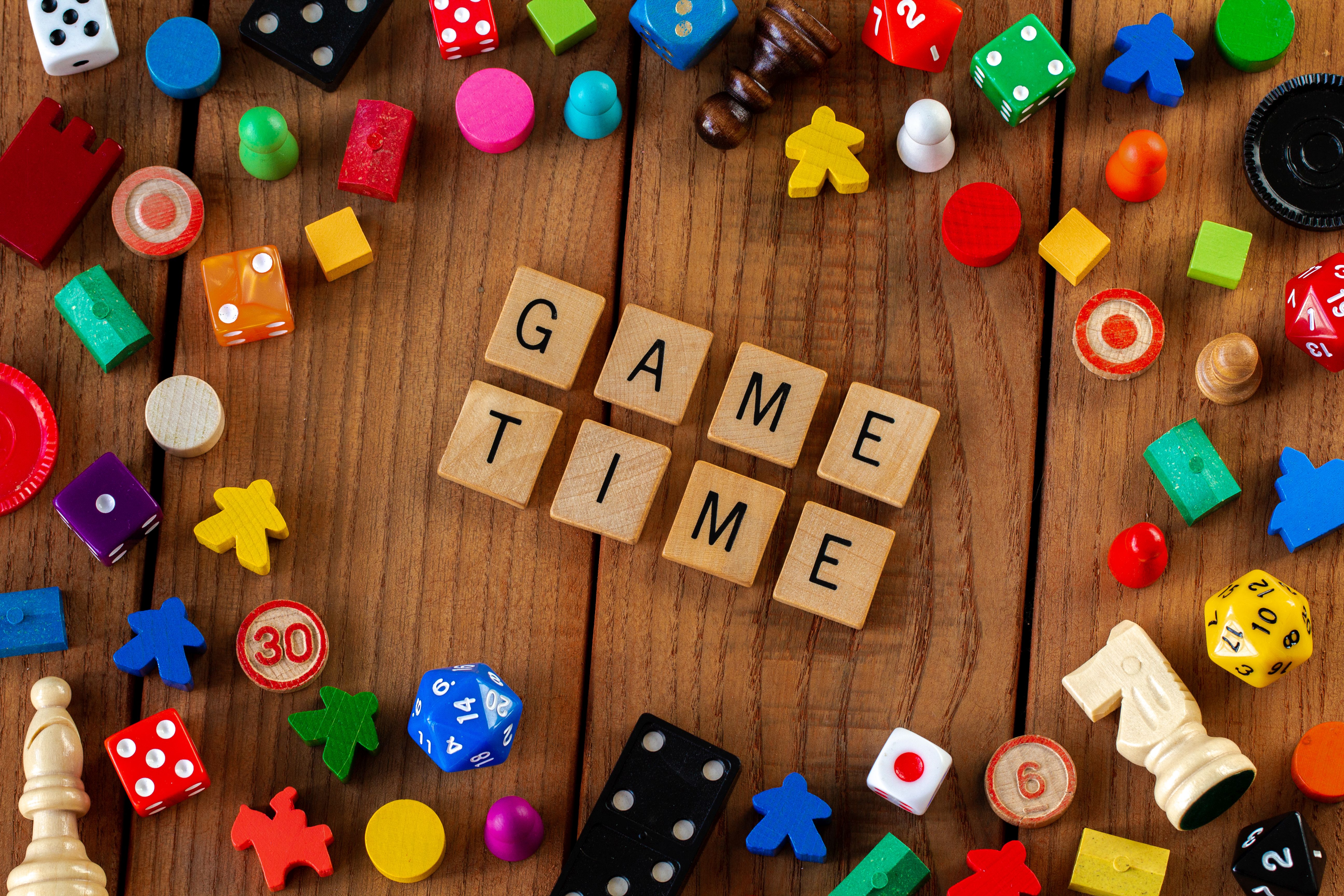 Game Time flyer for Main Library. Image includes random game pieces and the words Game Time.