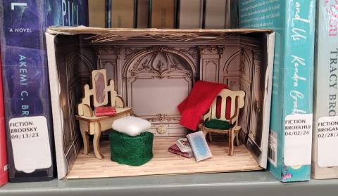 Miniature room on a bookshelf